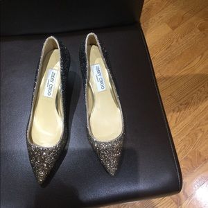 Jimmy Choo glitter pumps.